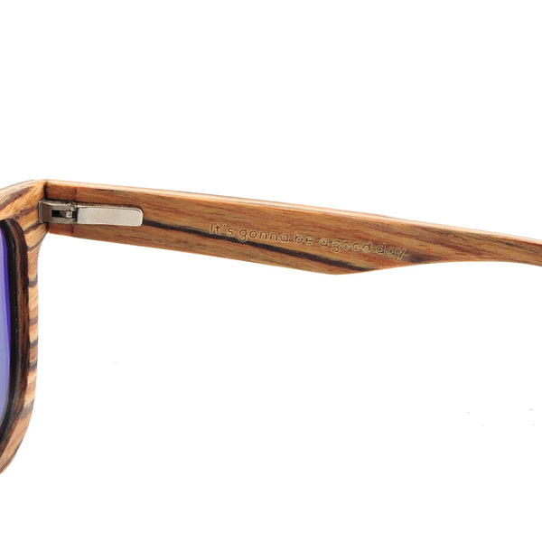 Wooden-framed sunglasses with a visible brand name on a white background