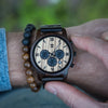 Wild black sandalwood wooden watch worn on wrist, showcasing 45mm case size and natural wood band texture