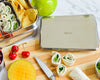Ecozoi stainless steel ice packs placed inside a kids lunch box to keep food cold
