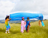 Sarah's Silks Double Star Playsilk laid out outdoors showing vibrant hand-silkscreened print