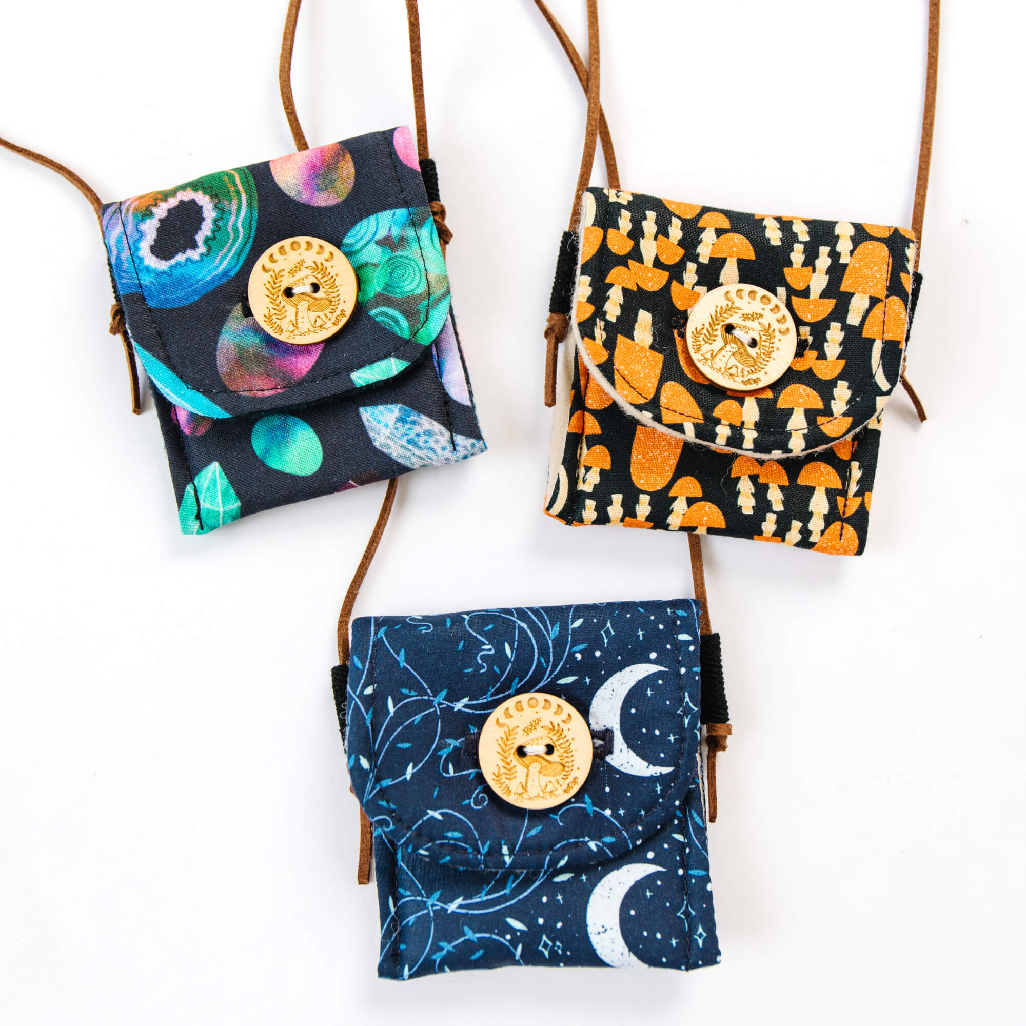 Handmade crystal bag for kids in mushroom fabric with wooden button and faux suede drawstring cord