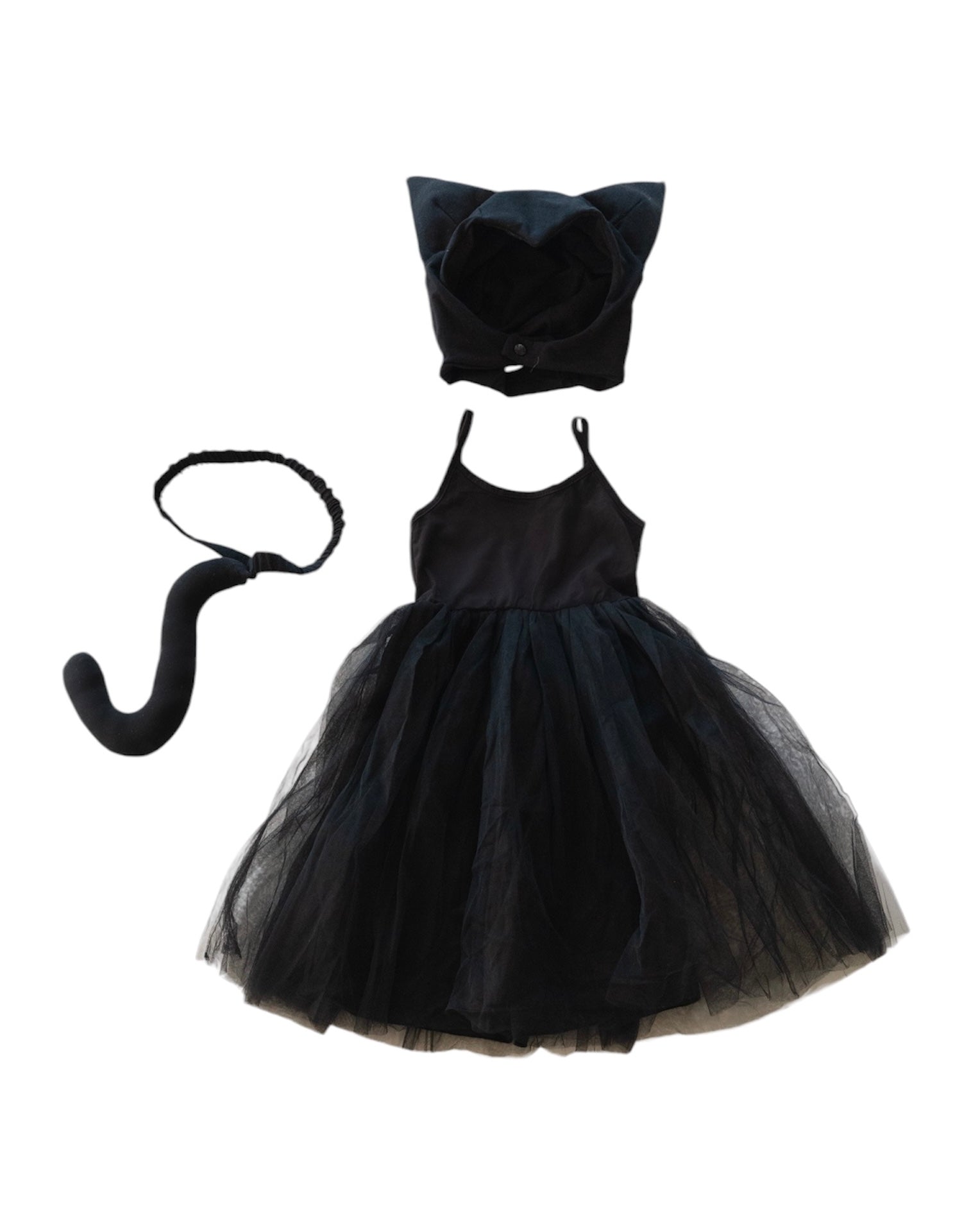 Black cat-themed dress with matching hat and tail on a white background