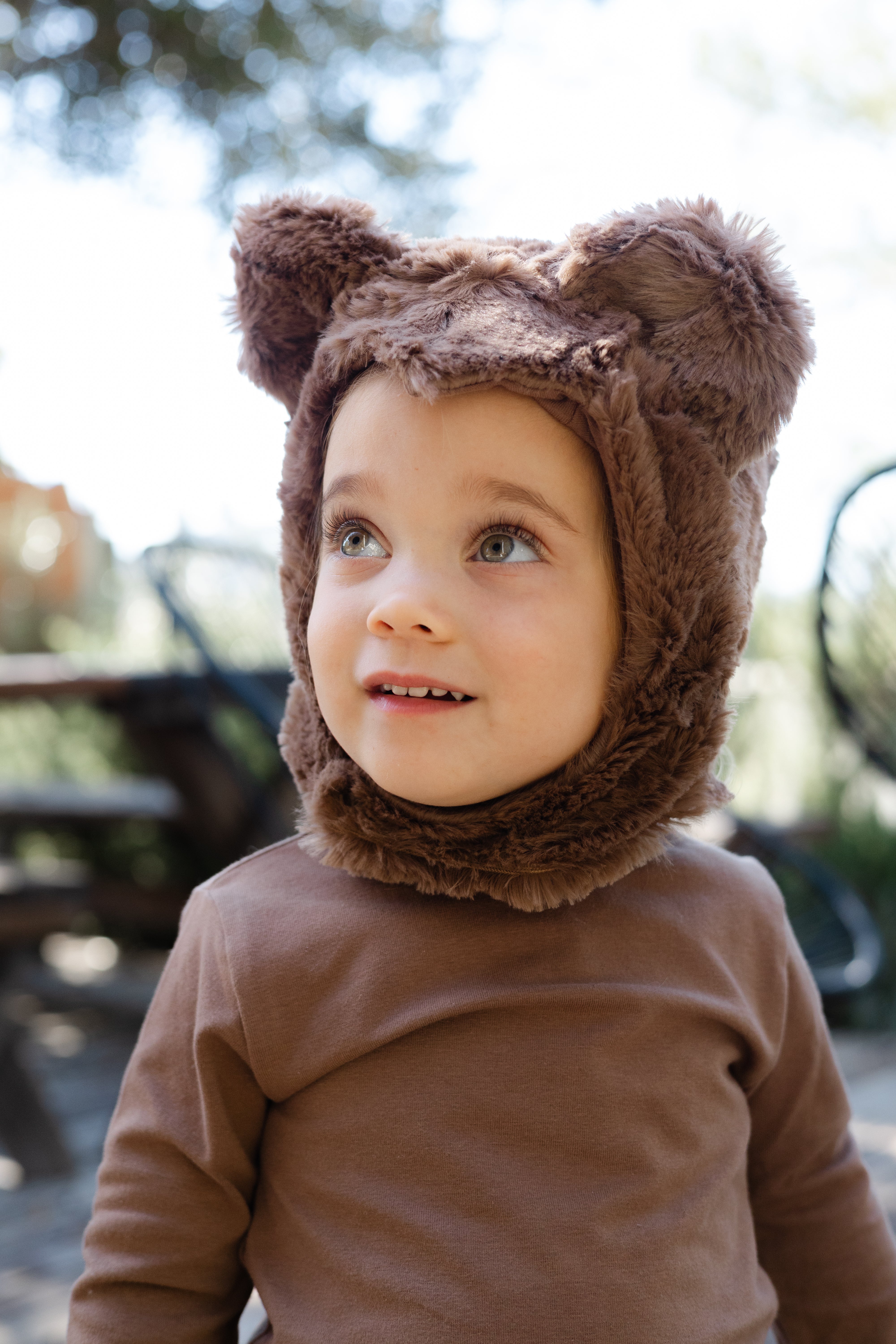 Child wearing the Bear Hat by Band of the Wild