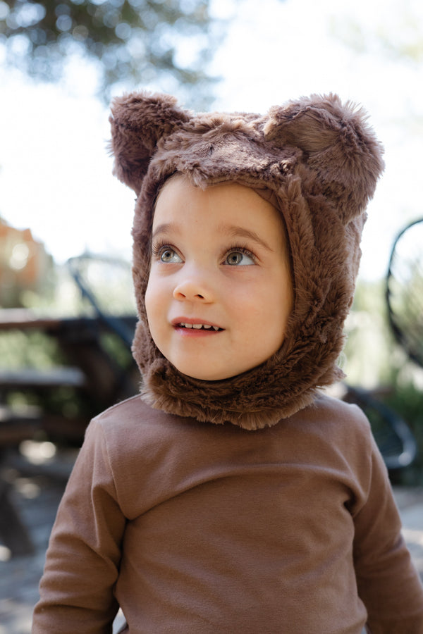 Child wearing the Bear Hat by Band of the Wild