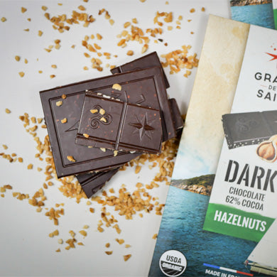 Experience the perfect blend of dark chocolate and hazelnuts. This rich and decadent chocolate bar is a must-try for any chocolate lover.