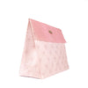 Close-up of magnetic snap closure on pink EverWrap reusable gift bag