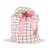 EverWrap EverTie large reusable gift bag with black grid pattern and satin ribbon closure