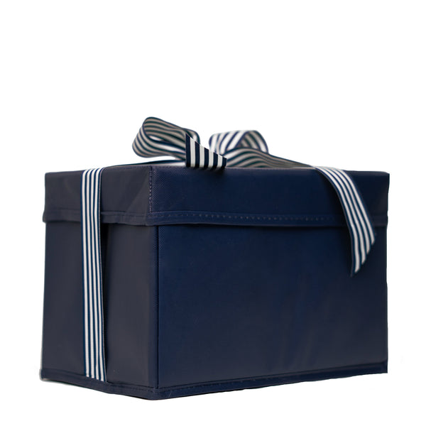 EverBox medium navy blue reusable gift box shown folded flat for compact storage
