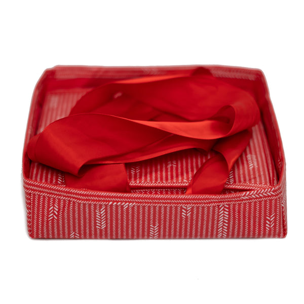 EverBox small red and white reusable gift box styled with a wrapped gift inside