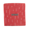 Close-up of red satin ribbon bow on EverWrap EverBox small collapsible gift box