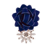 Wooden snowflake charm styled on a wrapped winter gift with EverBow ribbon