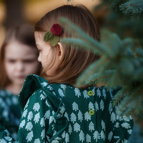 Detail shot of ruffle trim on Mon Coeur recycled cotton fleece dress for girls