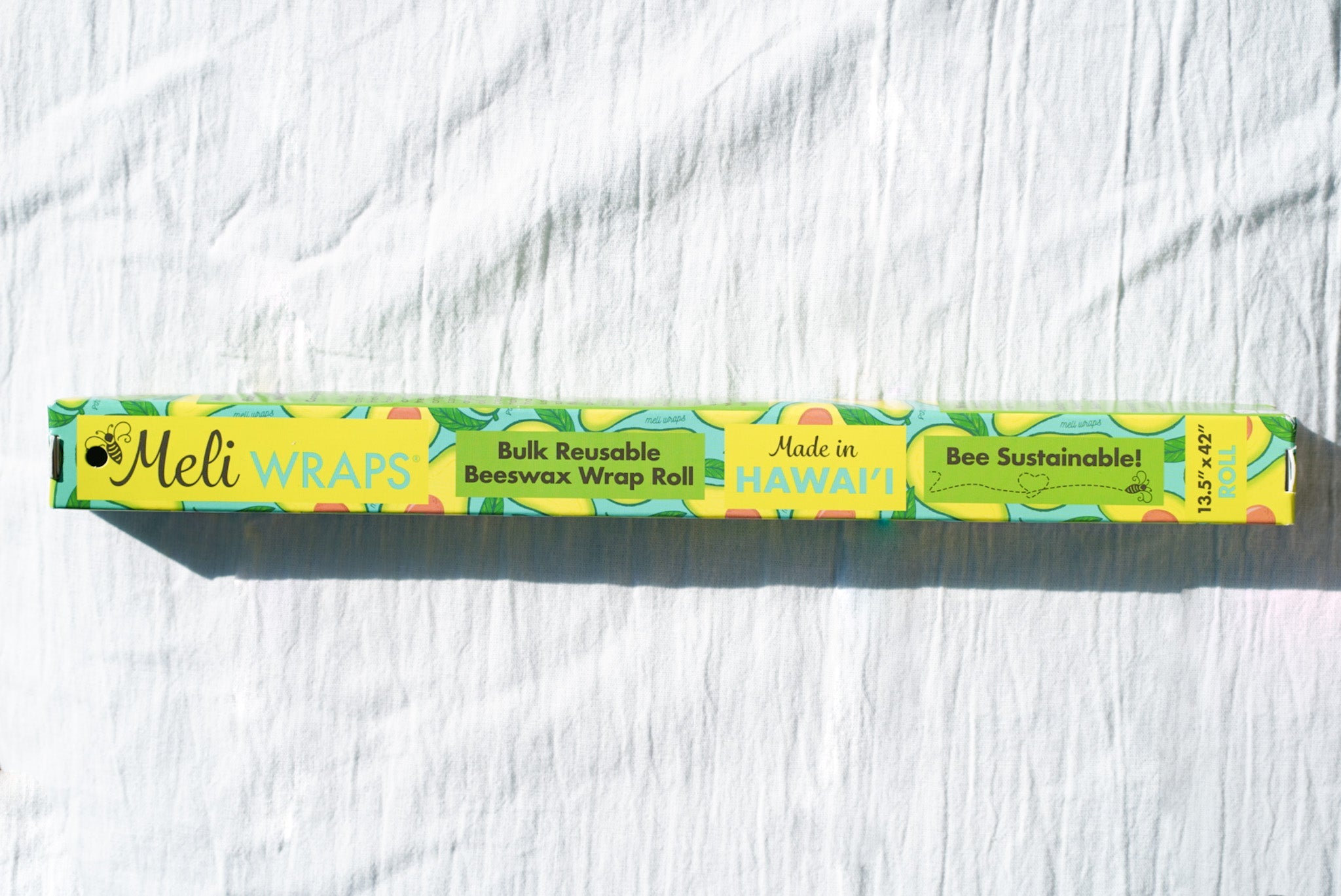 Meli Wraps beewax wrap roll on a white textured background
