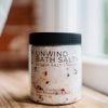 Soulistic Root Unwind Herbal Bath Soak jar with dried botanicals and Epsom salt