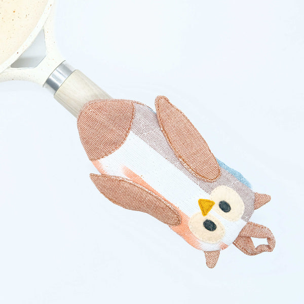 Ditch oven mitts! Owl Skillet Handle Holder - heat-resistant, cute owl designs, handmade in Guatemala. Safer grip, unique kitchen gift. Support artisans, shop now!