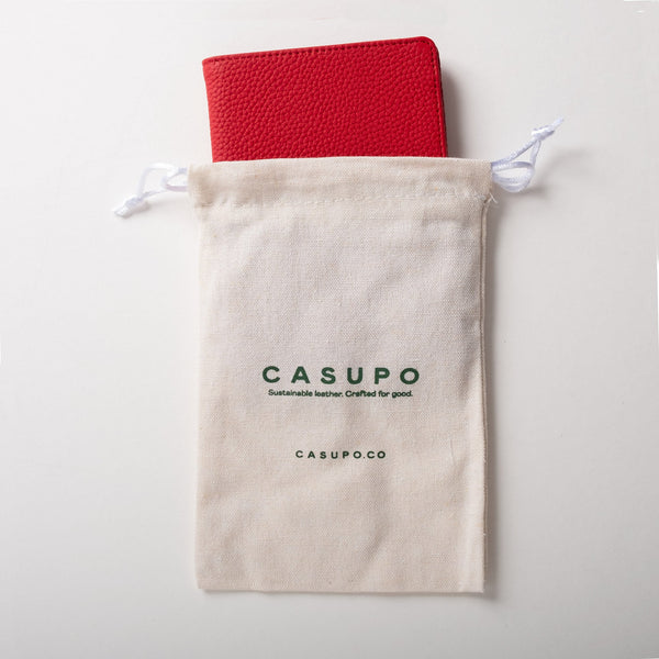 Red product on a beige drawstring bag with 'CASUPO' branding on a light gray background