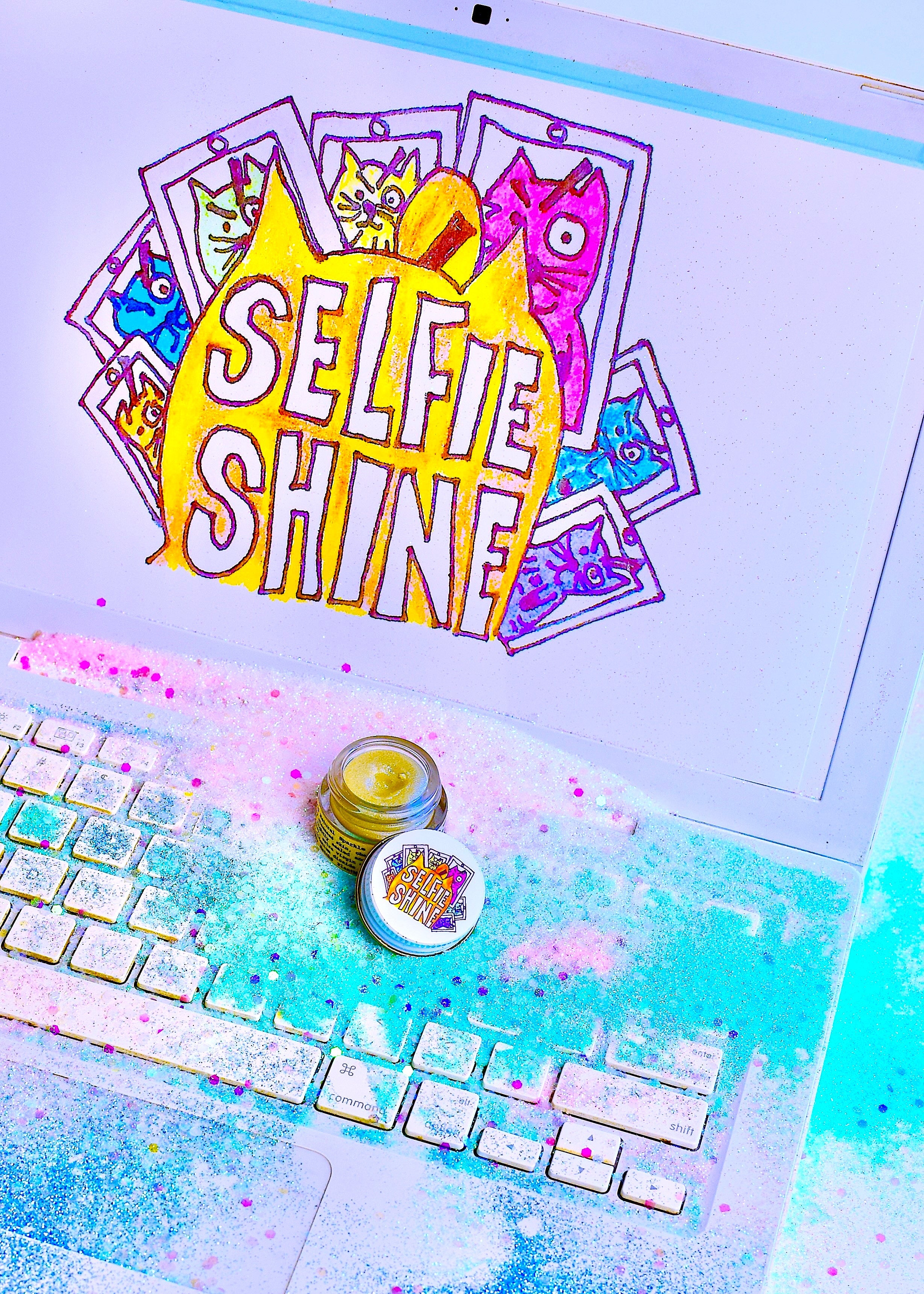Colorful 'Selfie Shine' product with a keyboard and phone on a light background