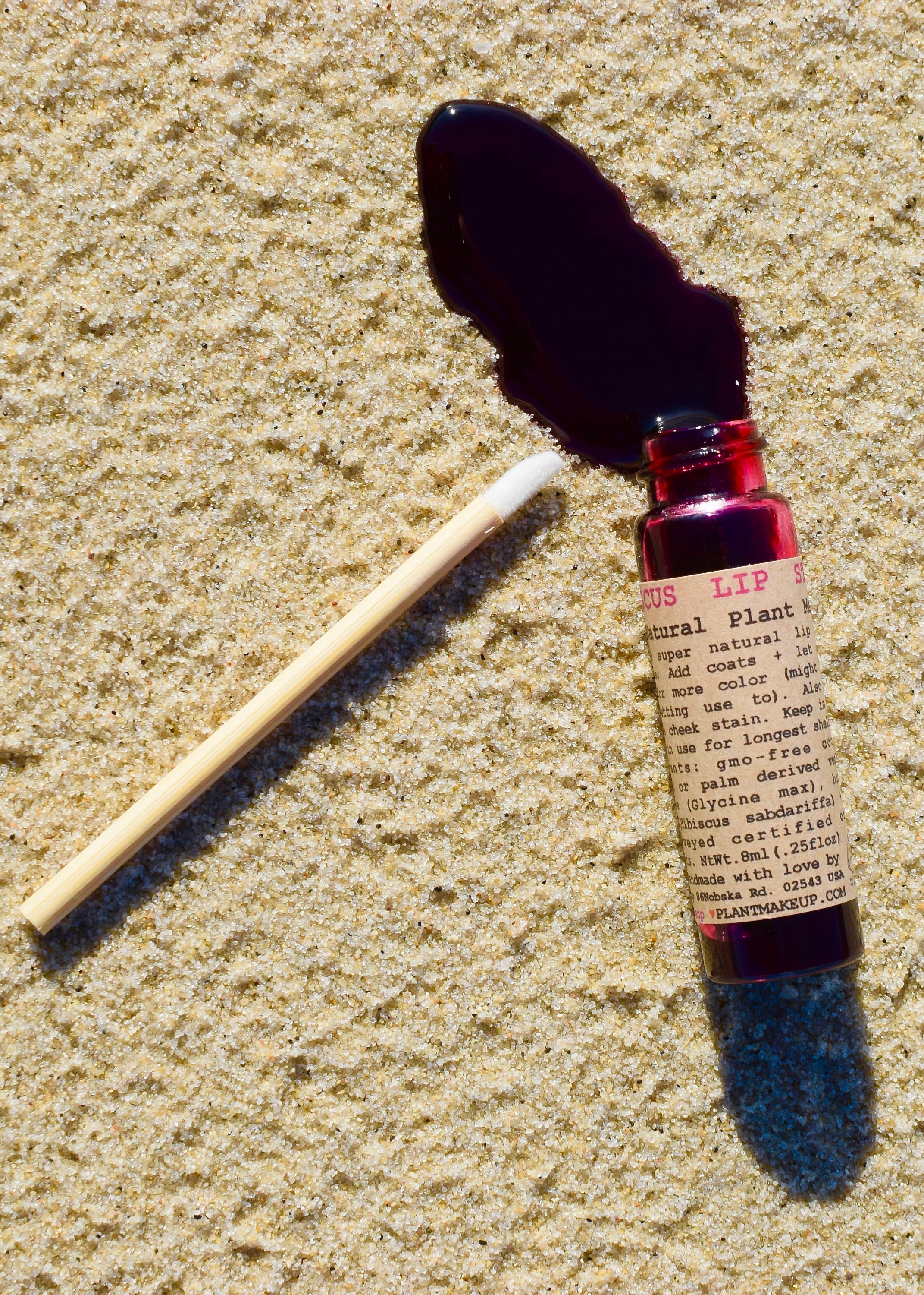 Reusable bamboo makeup wand included with Hibiscus Lip Stain