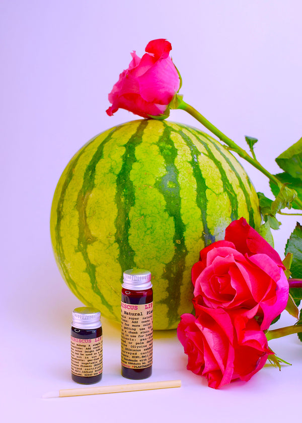 Hibiscus Lip Stain natural lip tint packaged in eco-friendly glass vial