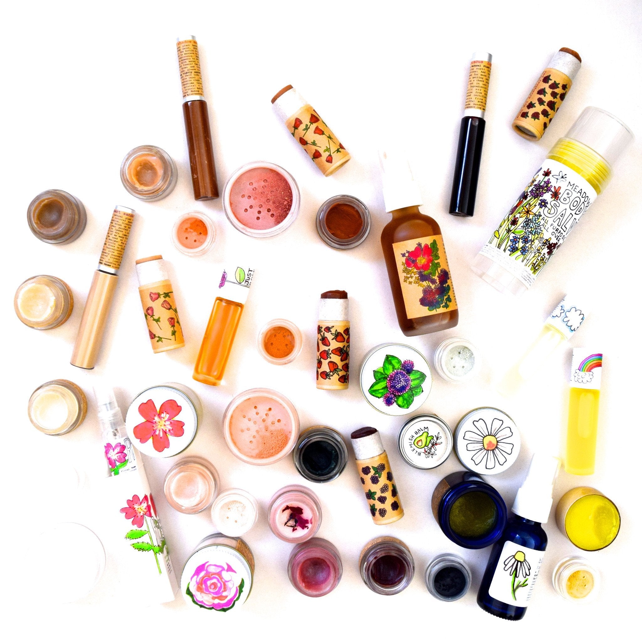 Assorted makeup products on a white background
