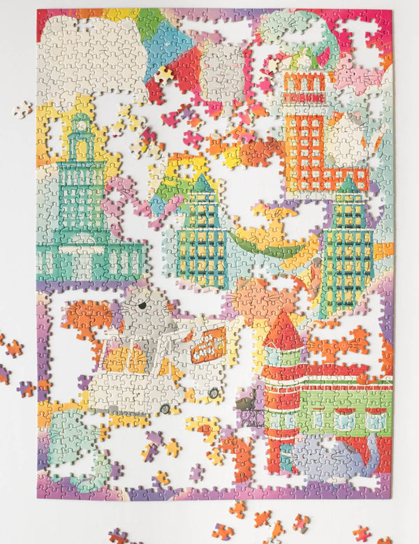 Cat Town Whimsy 1000-piece puzzle pieces spread out, showing random-cut snug-fit pieces and low-dust chipboard quality