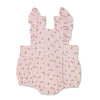 Baby wearing organic muslin flutter sleeve romper in rainbows and ice cream print by Apple Park