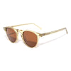 Gold-framed sunglasses with brown lenses on a white background