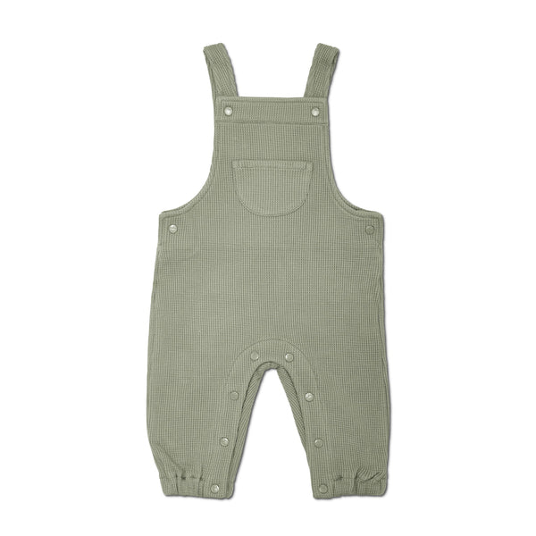 Green ribbed overalls on a white background