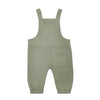 Green ribbed knit overalls on a white background