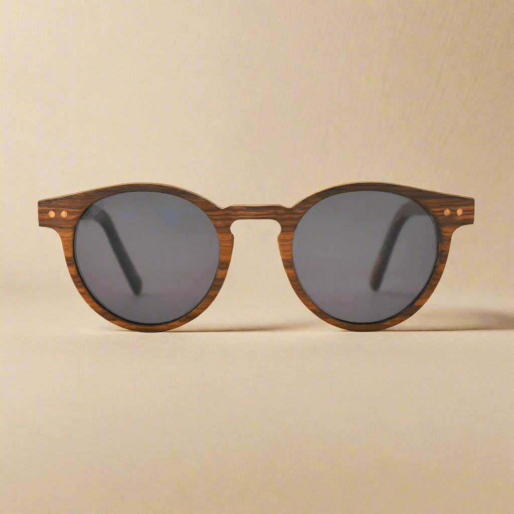 Wooden-framed sunglasses with dark lenses on a beige background