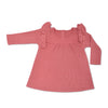 Pink baby dress with ruffled shoulders on a white background