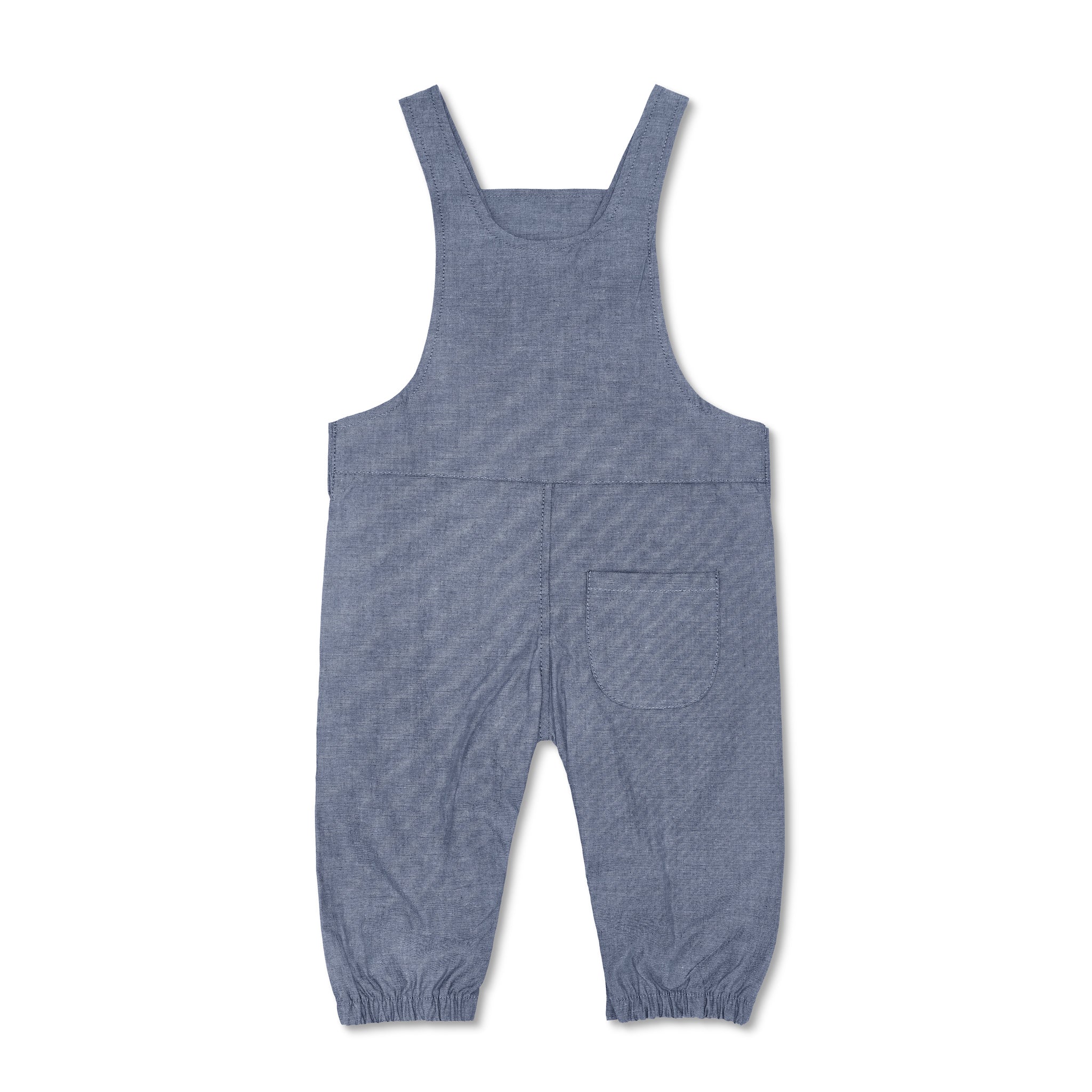 Close-up of snap closures on organic baby overalls in chambray cotton