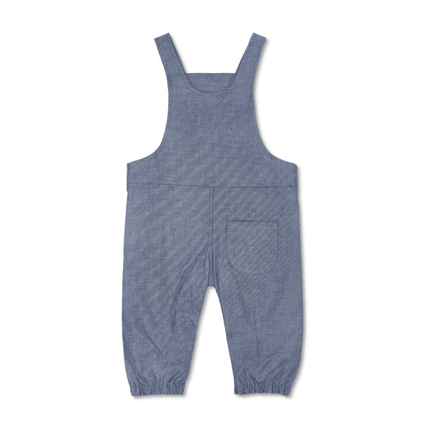 Close-up of snap closures on organic baby overalls in chambray cotton