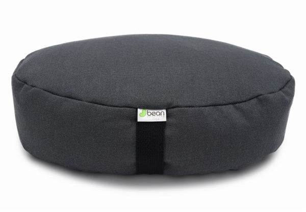 Gray meditation cushion with 'bean' brand label on a white background