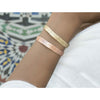 HHPLIFT handcrafted etched brass and copper cuff bracelets styled on wrist