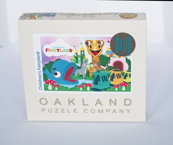 Completed Children's Fairyland 300-piece puzzle laid out showing whimsical illustrated scenes of the Oakland theme park