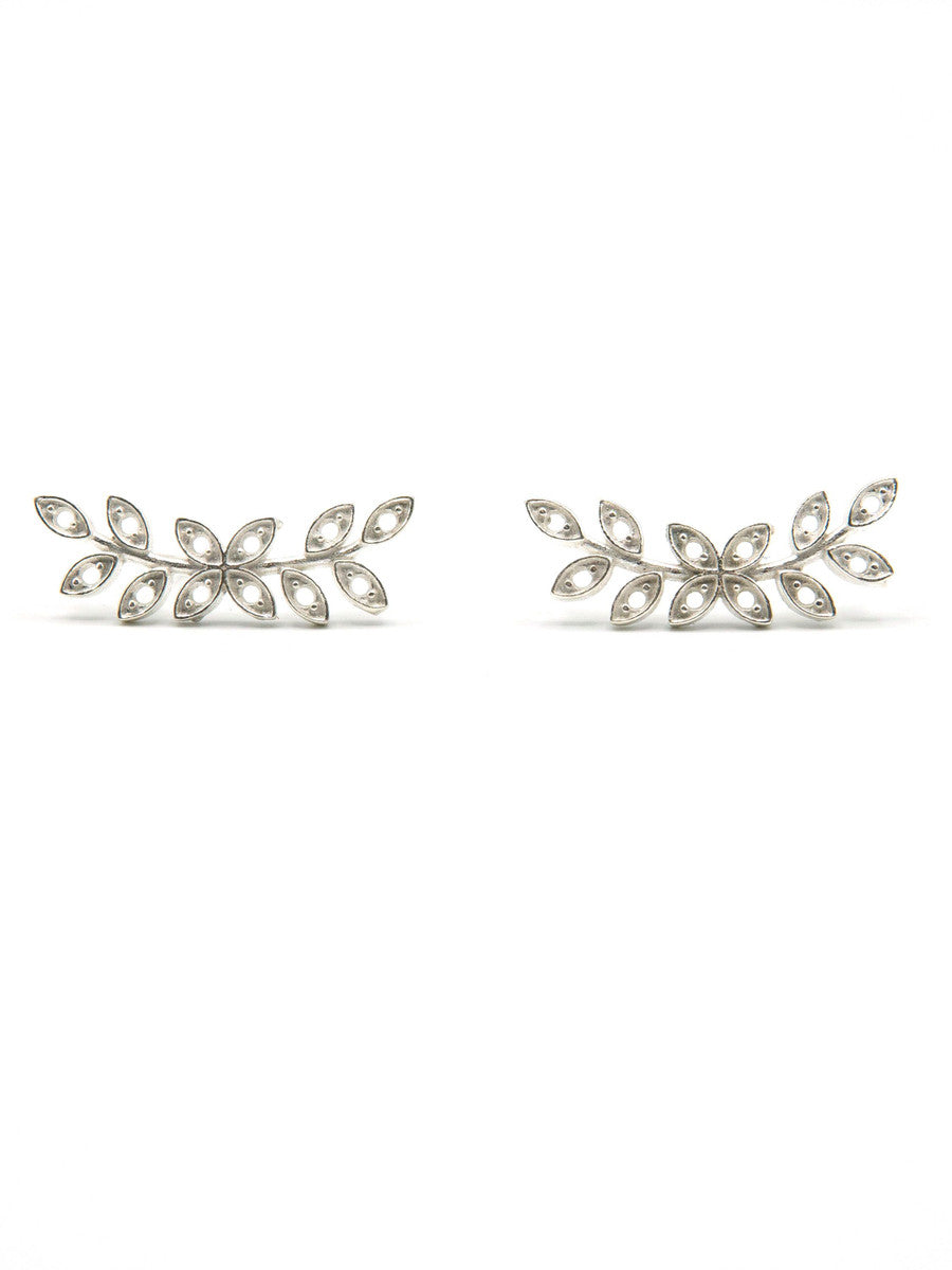 Dainty Branches silver leaf stud earrings by Fair Anita on a neutral background