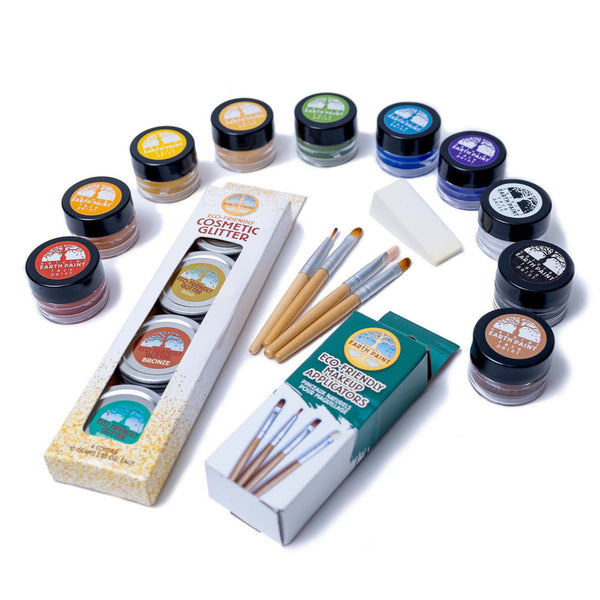 Collection of cosmetic glitter jars and applicators on a white background