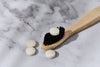 Close-up of Desesh zero waste toothpaste tablets — natural mint flavour, SLS-free formula