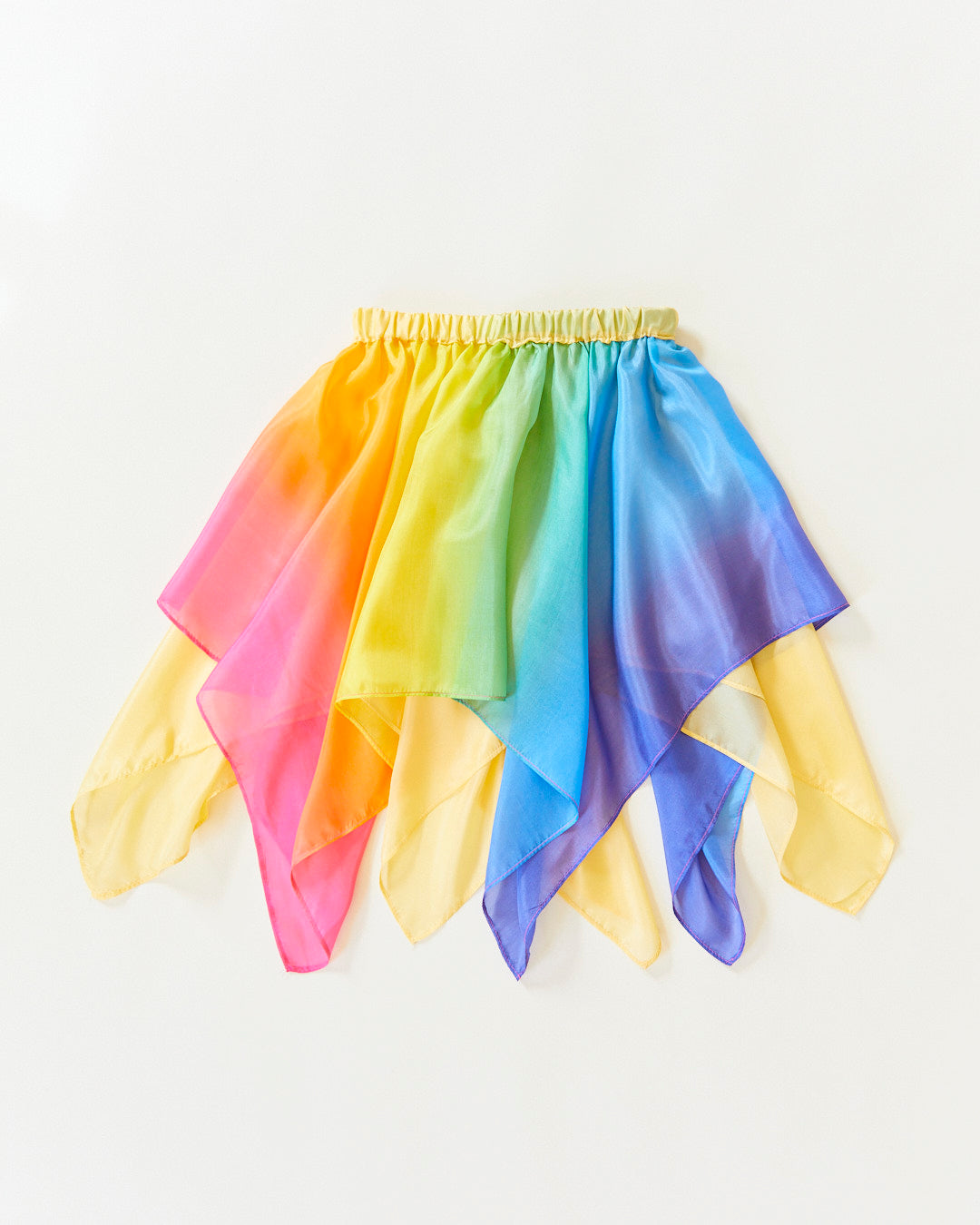 Transform your child into a magical fairy with our Rainbow Silk Fairy Skirt. This versatile and comfortable skirt is perfect for dress-up, Halloween, and endless imaginative adventures.