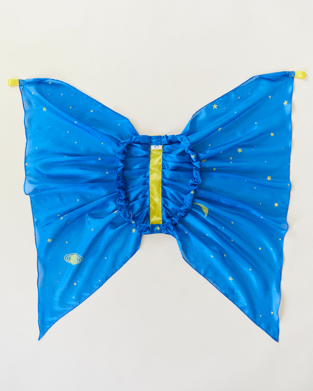 Blue butterfly costume wings with yellow accents on a light gray background. Spark your child's imagination with our Star Fairy Wings. Made from 100% pure silk, these eco-friendly dress-up wings are perfect for open-ended play, supporting creativity and fun.