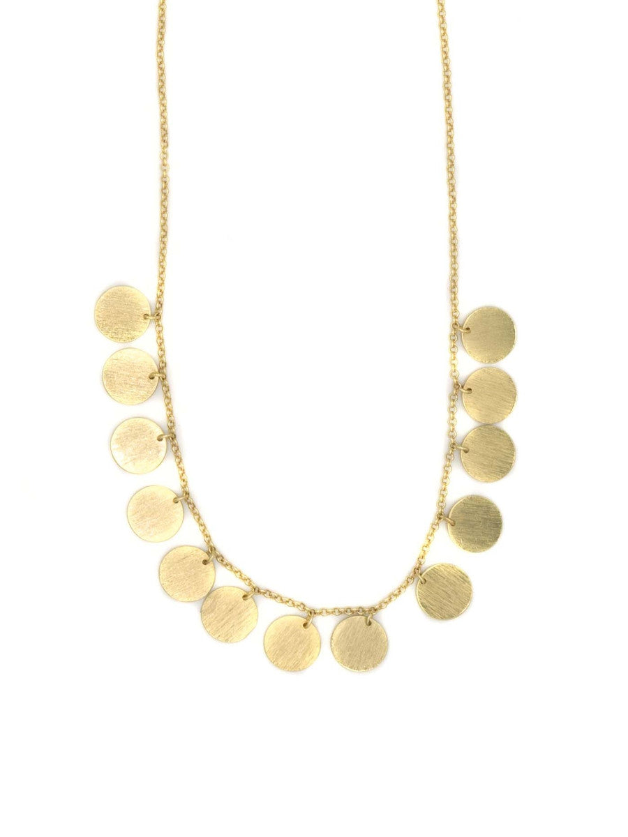 Gold necklace with circular pendants on a white background