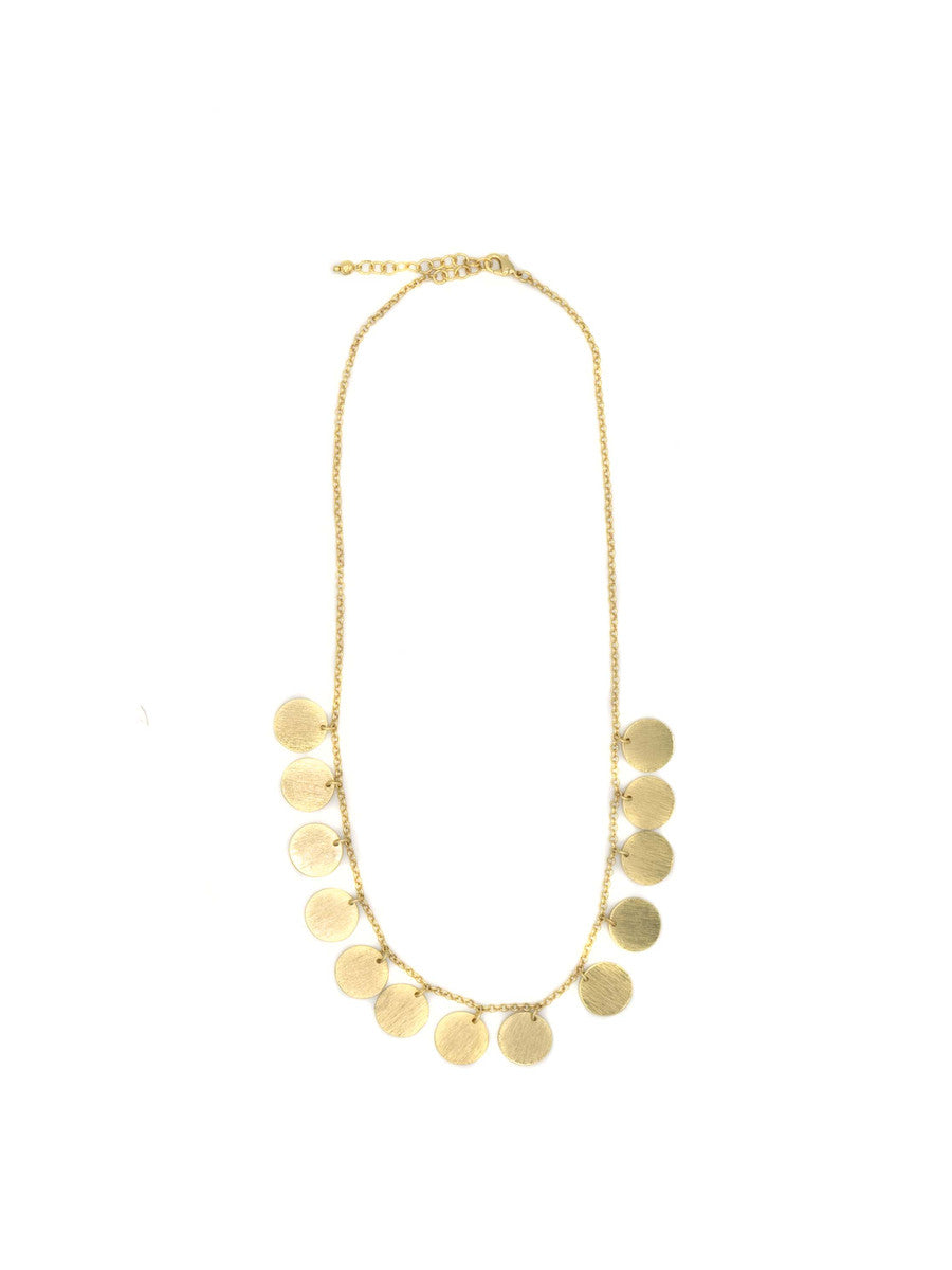 Gold necklace with circular pendants on a white background