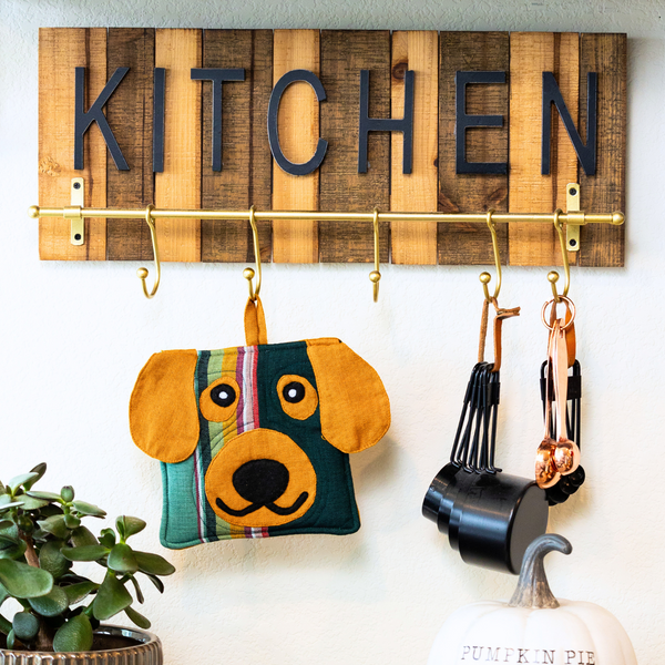 This charming dog pot holder is more than just a kitchen accessory. It's a piece of art, handcrafted by skilled artisans and made from sustainable materials.