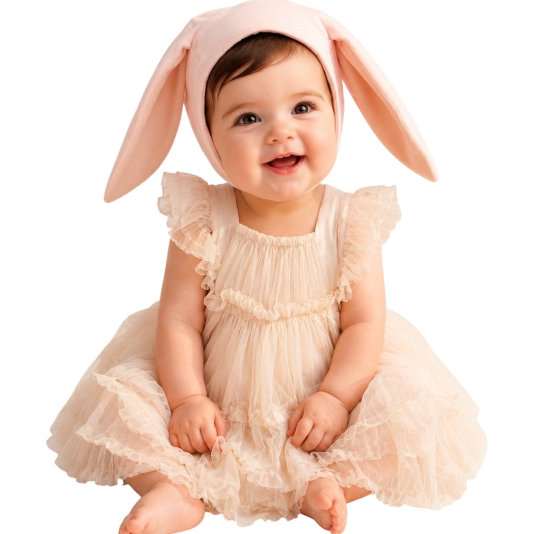 Baby wearing the Pink Bunny Bonnet with snap closure under the chin