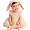 Baby wearing the Pink Bunny Bonnet with snap closure under the chin