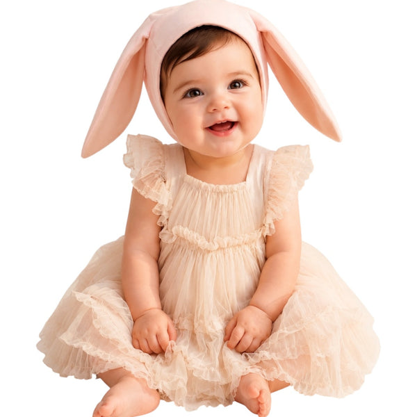 Baby wearing the Pink Bunny Bonnet with snap closure under the chin
