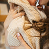 Soft 100% cotton baby blanket in warm Macadamia by Plum+Sparrow