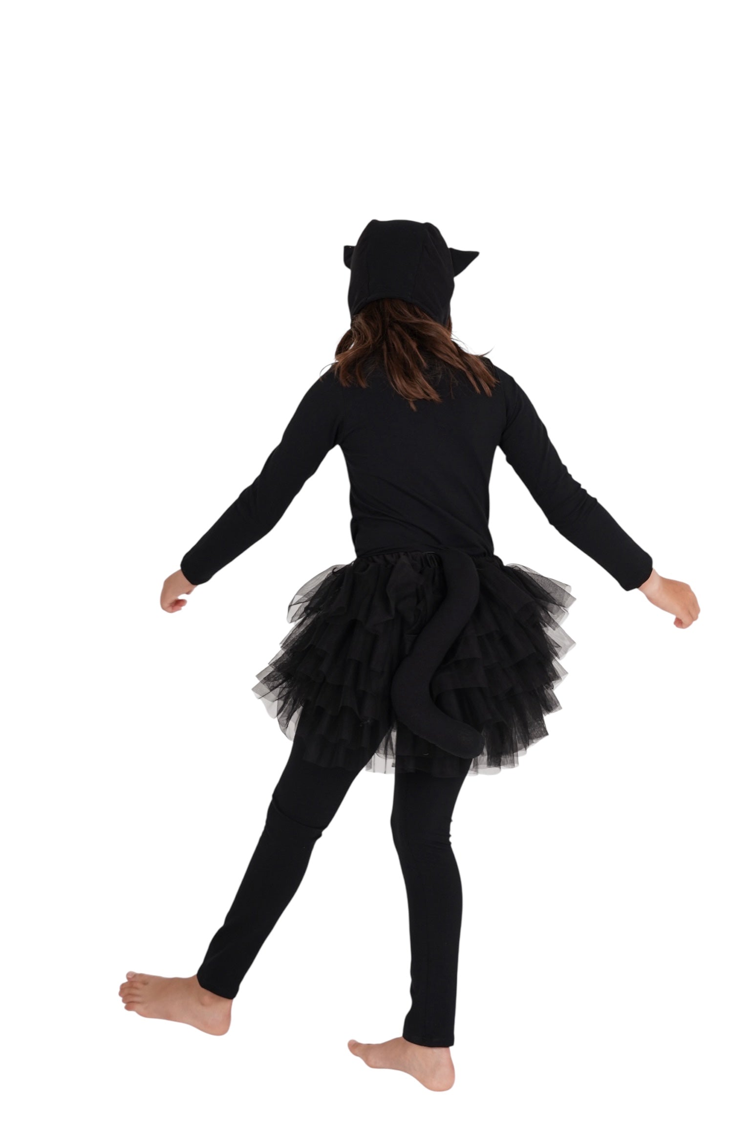 Person wearing a black cat costume with a tutu on a white background