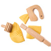 Wooden play dough tools including a rolling pin, cutter, and hook on a white background.
